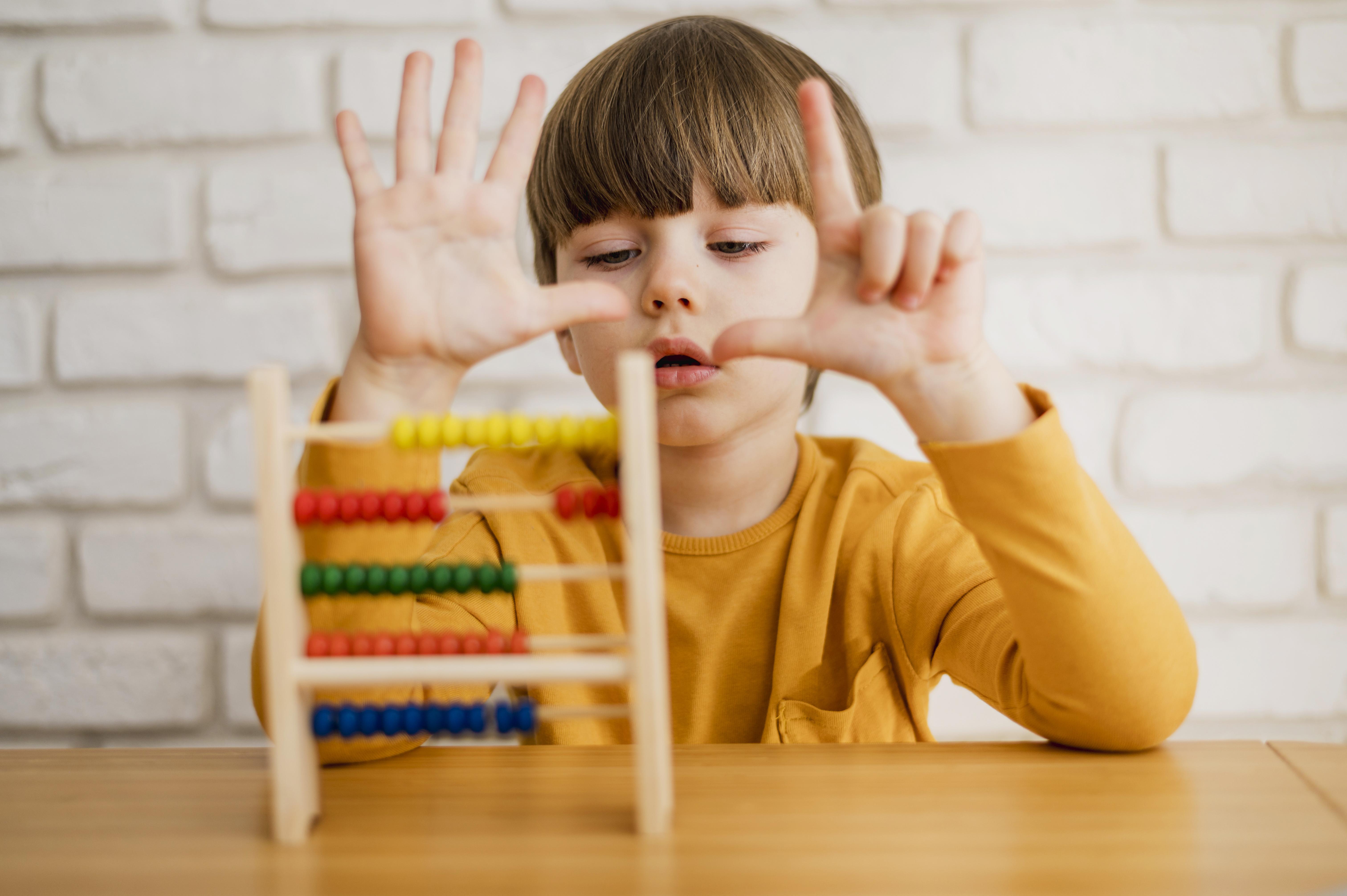 front-view-child-using-abacus-learn-how-count.jpg